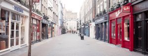 An empty high street, UK recovery slows