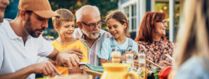 Grandparents with Grandchildren and children enjoying a family dinner