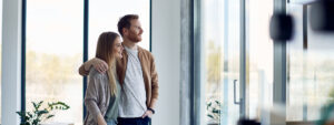 Happy couple at the sale of their flat