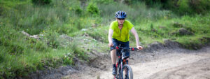 Man riding his bike