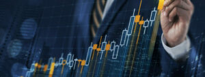 Businessman with economic graph, prospects of stronger economic growth