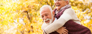 Older couple enjoying an Autumn walk