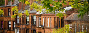 Row of Red Sandstone Tenement Flats Southside of Glasgow, Scotland, UK
