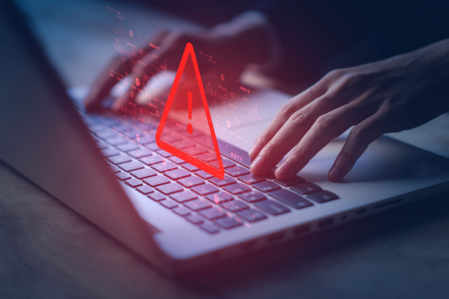 laptop and warning sign about cloning scams