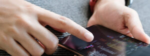 Close up of a person scrolling through crypto currency