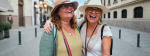 Friends on holiday, happy their home insurance is in place